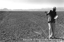 pgm0216 Maria Reiche measuring lines on the Nasca desert in 1977