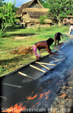 fgga0238 drying a freshly cut canoe